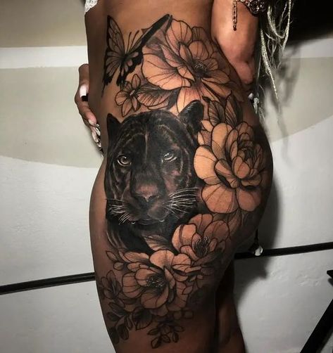 19 Hip and Thigh Tattoo Ideas for Women: Unleashing Your Artistic Expression Big Side Leg Tattoos Women, Tiger Thigh Tattoo For Black Women, Cat Hip Tattoo, Hip Tattoo Big, Thigh Cover Up Tattoo, Black Panther Tattoo For Women, Panther Tattoo For Women, Big Cover Up Tattoos For Women, Big Thigh Tattoos For Women