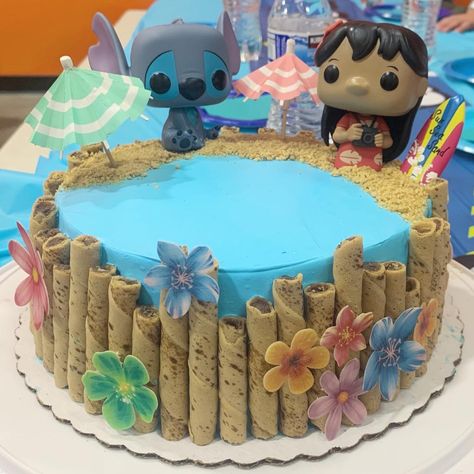 Lilo and Stitch, Funko Pop Cake Pirouettes, Edible Flowers, Graham Cracker Sand, Whipped Frosting, Chocolate Birthday Cake Funko Pop Cake, Stitch Funko Pop, Miniature Camping, Lilo And Stitch Cake, Frosting Chocolate, Camping Scene, Stitch Cake, Pop Cake, Chocolate Birthday Cake