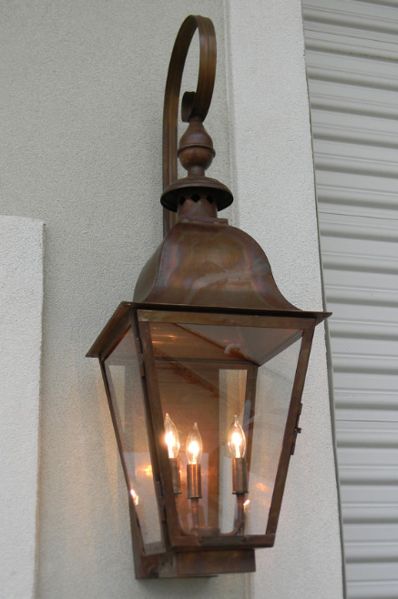 Handcrafted with high quality copper, the Quebec design evokes tradition and charm. Price reflects lantern as shown with Top Finial and Top Scroll. Available in Gas Flame - Call us directly (Contact information below), or click on "Have a question" and send us a note for details. Mounting options available: Wall Mo Copper Outdoor Lighting, Carriage Lights, Cottage Lighting, Tower Light, Football Top, Copper Lantern, Exterior Light Fixtures, Gas Lanterns, Gas Lights