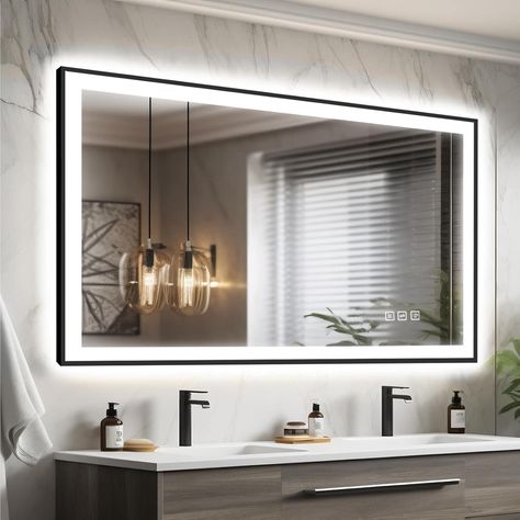 Transform your bathroom with the Waterpar LED Black Framed Bathroom Mirror, engineered for ultimate brightness and functionality. The innovative dual lighting system combines front and back lighting, delivering unmatched clarity and illumination for all your grooming routines. Featuring three adjustable color temperatures and dimmable settings, this mirror caters to your every lighting need while the anti-fog and defog functions ensure a clear view even after a hot shower. Crafted from robust 5mm tempered glass and rust-resistant aluminum, it's designed for durability and safety. Enjoy superior brightness with high-efficiency LED strips and easy installation with French Cleats. Whether you choose to plug it in or opt for hardwiring, this mirror fits seamlessly into your modern bathroom upg Framed Led Bathroom Mirror, Lighted Mirror For Bathroom, Led Bathroom Mirror Ideas, Bathroom Mirror Ideas Double Sink, Large Bathroom Mirror Ideas, Mirror Vanity Bathroom, Lighted Mirrors For Bathrooms, Mirror Bathroom Ideas, Light Up Vanity