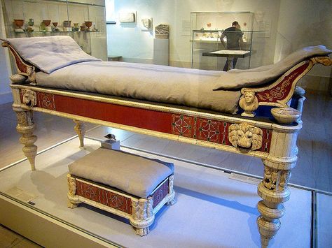 Roman couch . These pieces of furniture come from the imperial villa of Lucius Verus (co-emperor, A.D. 161-169) on the Via Cassia outside Rome. On the couch legs are friezes of huntsmen, horses and hounds flanking Ganymede. On the sides of the bed frame, the lion protomes (animal head adornments) have eyes inlaid with glass. On the footstool are scenes of winged cupids and leopards. Metropolitan Museum of Art  NYC Ancient Roman Houses, Roman House, Roman Artifacts, Roman Villa, Roman Era, Rome Antique, Empire Romain, Classical Antiquity, Roman Architecture