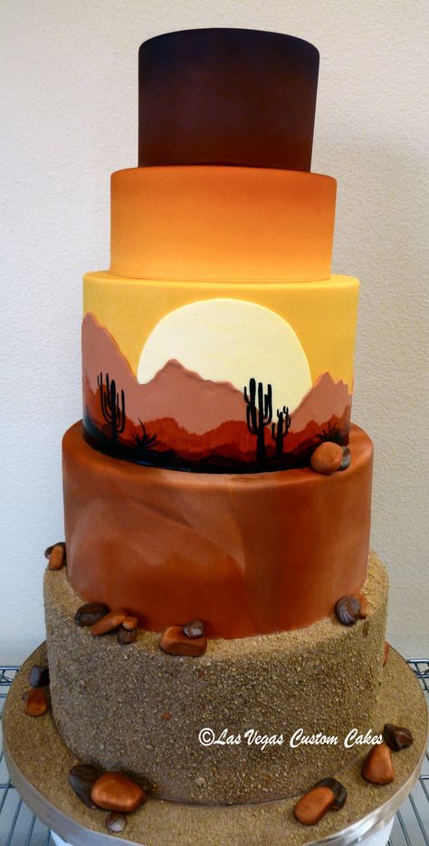 Unique Wedding Cake with a sunrise desert scene made by Las Vegas Custom Cakes Desert Cake Design, Scenery Cake Ideas, Desert Themed Wedding Cake, Southwestern Cake Ideas, Desert Theme Cake Ideas, Arizona Cake Ideas, Sunrise Cake Design, Desert Birthday Cake, Two Cakes Side By Side Birthday