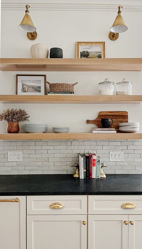 Light Wood Open Shelving Kitchen, Floating Wood Shelf Kitchen, Lights Over Open Shelves In Kitchen, Lights Over Floating Shelves Kitchen, Floating Wood Kitchen Shelves, White Oak Shelf, Wood Open Shelves Kitchen, Oak Floating Shelves Kitchen, Floating Shelves With Sconces