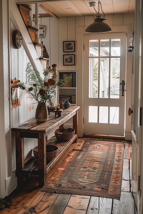 Explore warm home aesthetic entryway ideas that create a cozy and inviting atmosphere. Embrace vintage and rustic elements for a charming space. 🌸🏡 Vintage Entrance Hall, Minimal Cozy Aesthetic, Cozy Home Entrance, Cozy Homestead Aesthetic, Cottage Cozy Home Aesthetic, Minimal Cozy Home, Cozy Entryway Ideas, Cottagecore Entryway, Rustic Home Aesthetic