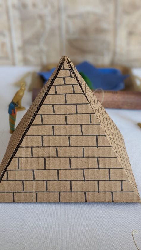 An Amazing Ancient Egypt Party – Ideas & Inexpensive Ideas – Frolicking Fox Cubs Pyramid Art Project, How To Make A Pyramid For School Project, Ancient Egypt Party Decorations, Ancient Egypt Classroom Display, Egypt Decorations Classroom, Project Model Ideas, Ancient Egypt Decorations, Egypt Activities For Kids, Egypt Vbs Decorations