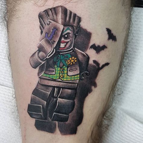 Did this 'Arkham City' style 'Lego Batman 2: DC Super Heroes' piece recently. It's a little red and irritated sorry. Heaps of fun and would love to do more Lego themed work.  #tattoo #tattooed #tattooing #tatt #ink #inked #tattoosleeve #sleeve #popculturetattoo #popculture #tattooartist #tattooart #lego #legotattoo #joker #thejoker @thejokerofficial #gotham #arkhamcity #legobatman #inkjecta #inkjectananoelite #inkjectanano #mawdsleygreywash #vandalizetheskin #electrum #electrumstencilprimer  #hu Batman Joker Tattoo, Lego Tattoo, Lego Batman 2, Game Tattoo, Dc Tattoo, M Tattoos, Batman 2, Batman Tattoo, Work Tattoo