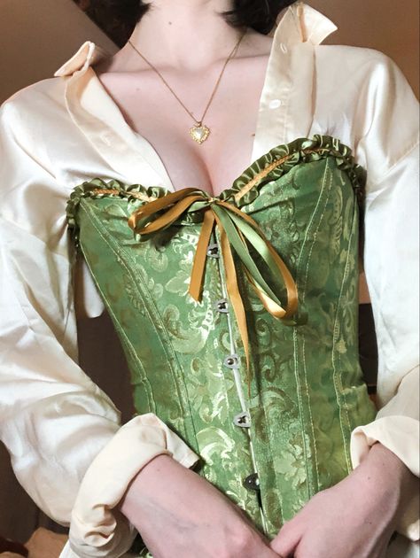 Trendy corset with satin shirt outfit inspo Green Corset Aesthetic, Corset With Shirt Underneath, Corset With White Button Up, Green Corset Outfit Ideas, Green Corset Costume, Corset And Shirt Outfit, Corset On Top Of Shirt, Corset Aesthetic Outfit, Green Satin Shirt Outfit