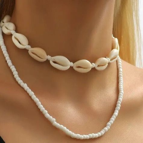 This perfect shell choker necklace  for boy or girl  is a unique personality aesthetic accessories  gift  for special days such as concerts, parties, upcoming Christmas, New Year, Valentine's Day, Engagement, Promise, Birthday, Celebrations, Father's/Mother's Day, anniversaries, Halloweens, etc.... Product details: *Made of plastic cowries *Lightweight *Adjustable; fits most necks, 40 cm +7 cm chain extension   *Summer completion cowrie shell design  *A beautiful sheer bag- gift Don't forget to choose gift wrap which is a handmade craft GREETING ENVELOP or 3D FLOATING DISPLAY CASE during purchasing (the last picture). All of our jewelry is 100% handmade and made in non-smoking area. *Colors may differ slightly from the original due to the configuration of your computer. We also offer your Shell Necklace Aesthetic, Chokers Aesthetic, Summer Jewelry Diy, Seashell Choker, Personality Aesthetic, Girls Choker, Choker Handmade, Boho Chique, Aesthetic Accessories