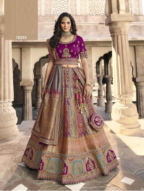 "Saundaryam Fashions| Banarasi Silk Bridal Lehenga in Multicolor with Embroidered work Description Style Note:- We have ensemble a symphony of enchanting piece to restyle your senses. Be the dazzling diva clad in this peach net lehenga choli with exquisite designs and patterns. This attire is crafted with thread and stonework from \" \"Saundaryam fashions\" Product Details: Fabric:Banarasi Silk, Silk Work:Embroidered, Sequence, Thread, Weaving Color Family:Multicolor Style:A Line Occasion:Bridal Angrakha Style Shirt, Angrakha Frock, Indian Designer Lehenga, Purple Lehenga, Hindu Quotes, Blouse Lehenga, Indian Lehenga Choli, Ruffle Saree, Net Lehenga