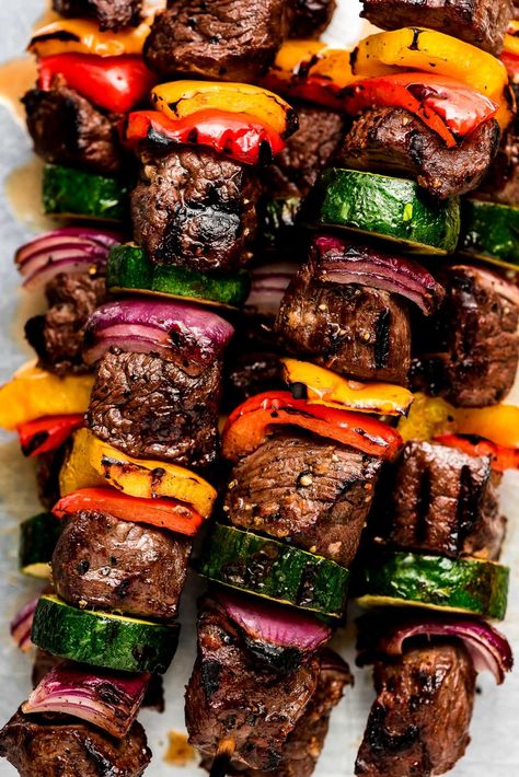 Steak Kabobs are an easy, healthy, and delicious entrée the whole family will love! Tender and juicy sirloin steak is marinated in a flavorful garlic marinade and threaded on skewers with crisp garden vegetables. Steak Kebabs In The Oven, Steak Kabob Marinade Recipes, Steak Skewer Recipes, Beef Kebabs On The Grill, Steak Skewers Grilled, Steak Kabobs In The Oven, Beef Kabobs In Oven, Beef Skewers Marinade, Beef Kabobs On The Grill