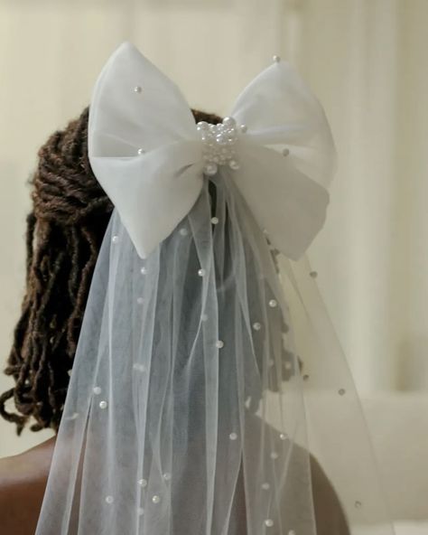 A touch of whimsy and elegance 🕊️ The Scatter Pearl Bow Veil by @hayzebridal is the perfect finishing touch for your bridal look. Delicate pearls and a dreamy bow create a statement that’s both timeless and modern. Shop the look at thebridalhouselondon.com G&G x #weddingveil #weddingbow #bridaloutfit #bridallook #weddinglook #weddingaccesories #luxurywedding #weddinginspiration Pearl Wedding Accessories, Bow Veil, Veils Bridal, Wedding Accesories, Pearl Bow, Wedding Bows, Bridal Look, Modern Shop, Pearl Wedding