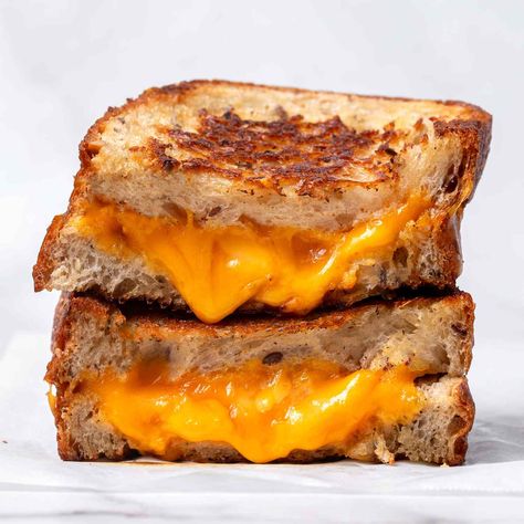 These Are the Best Cheeses for Grilled Cheese, According to Chefs Grilled Feta Cheese Sandwich, Best Cheese For Grilled Cheese, Best Bread For Grilled Cheese, Cheeses For Grilled Cheese, Three Cheese Grilled Cheese, Baked Grilled Cheese, Girls Luncheon, Easy Breakfast Brunch, Nostalgic Childhood