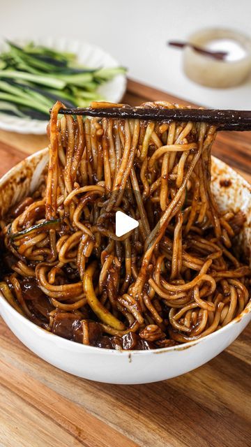 Christian Ou on Instagram: "Jajangmyeon, a popular Chinese Korean dish consists of thick chewy noodles tossed in savory black bean sauce and packed with meat and lots of veggie. I used to order Jjajangmyeon from Korean takeout, so often that I finally decided to make them myself at home. It is perfect for those days when you are craving something filling and comforting. It is super easy to make at home and tastes better than takeout!  2-3 Servings  Ingredients: Noodles 1/2 lb pork belly, cut into strips 1 cup daikon radish, diced 1 cup zucchini, diced 1 cup potato, diced 1/2 onion, chop into large chunks 2 tbsp oil 1/3 cup black bean paste 1/2 tsp salt  1 cup water Cornstarch slurry: mix 2 tbsp cornstarch with 2 tbsp water Garnish: thinly sliced cucumber  Directions:  1. Cook noodles accor Korean Takeout, Chewy Noodles, Korean Potatoes, Black Bean Paste, Sliced Cucumber, Cornstarch Slurry, Asian Meals, Daikon Radish, Potato Noodles