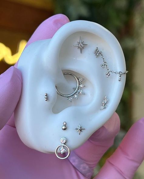 Ear Curation Both Ears, White Gold Ear Curation, Ear Curation Ideas Silver, Celestial Ear Curation, Silver Ear Curation, Ear Tattoo With Piercing, Ear Curation Gold, Ear Curation Silver, Ear Curation Ideas