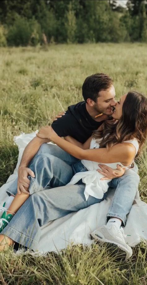 Engagement Photos Blue Jeans White Shirt, Engagement Pictures Height Difference, White Sweater And Jeans Engagement Photos, Riverside Engagement Pictures, Engagement Photos Open Field, Engagement Shoot Outfit Casual, Black Shirt And Jeans Engagement Photos, Engagement Photos Field Summer, Spring Mountain Engagement Photos