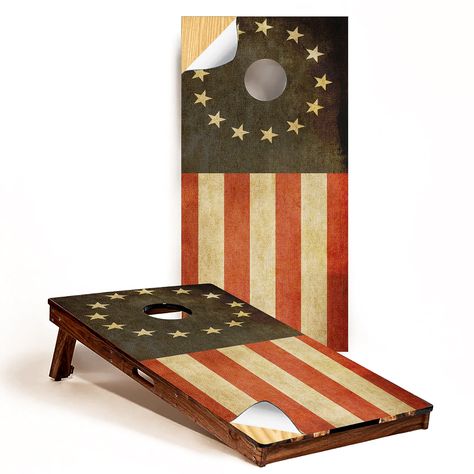 PRICES MAY VARY. VINYL CORNHOLE WRAPS: Easily customize any cornhole board! Perfect for personalizing your backyard bean bag toss game. Showcase your patriotic pride with GRAPHIX EXPRESS laminated Betsy Ross Distressed American Flag vinyl decal. Includes set of 2 sticker decals. Boards not included. VIVID GRAPHICS: The highest quality printed decals around! Attention to detail and superior graphic quality sets our vinyl American flag cornhole covers apart. Professional Eco-Solvent inks produce v Patriotic Cornhole Boards, Cornhole Board Wraps, Cornhole Boards Designs, Cornhole Wraps, Distressed American Flag, Bean Bag Toss Game, Cornhole Board, Betsy Ross, Bean Bag Toss