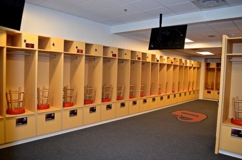 These college lockers for the Dickinson College Athletic Training Center are made using #Formica "Maple Woodline" plastic laminate with open fronts and combo lock door above.  Each locker has a flip up bench/lid for storage.  Interior of locker has double hooks and hanging rod.   Photo Courtesy:  Christian Payne Locker Room Layout, Aesthetic Locker, Dickinson College, Basketball Stuff, Gym Lockers, Lock Door, Architecture Concept, Architecture Concept Drawings, Athletic Training