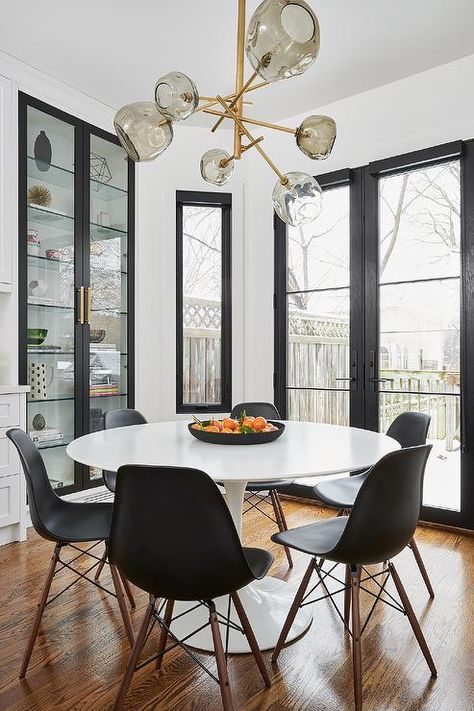 Ikea Docksta Table with Black Molded Plastic Chairs - Transitional - Dining Room Ikea Docksta Table, Ikea Docksta, Docksta Table, Ikea Dining Room, Tulip Dining Table, French Dining Chairs, Transitional Dining Room, Transitional Dining, Plastic Chairs