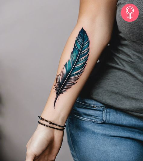 8 Simple Feather Tattoo Ideas With Inspiring Meanings Blue Feather Tattoo, Feather Tattoo Men, Simple Feather Tattoo, Native American Feather Tattoo, Feather Tattoo Ideas, Feather Tattoo Arm, Quill Tattoo, Feather Tattoo Colour, Wrap Around Wrist Tattoos