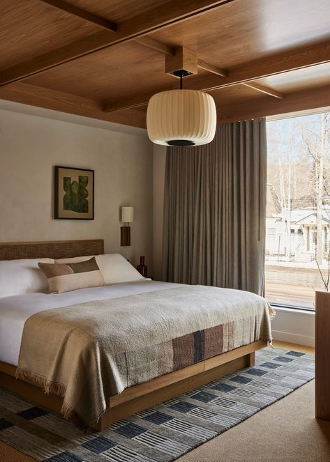 New York studio Post Company has designed warm, wood-filled interiors for a boutique hotel in Aspen, Colorado