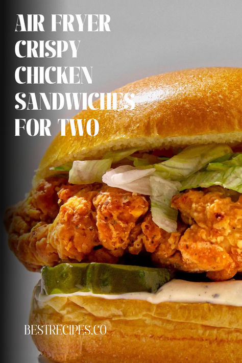 With these air-fried, crispy chicken sandwiches for two, you can skip the drive-thru! These crispy sandwiches, served with pickles, shredded lettuce, and herbed mayo, make a really tasty supper for two! Additionally, they use less oil than conventional fried chicken sandwiches because of air fryer technology. | chicken sandwiches | chicken sandwiches recipe | crispy chicken sandwiches | air fryer recipes | chicken recipes | dinner recipes | lunch recipes | lunch ideas | dinner ideas Chicken Sandwiches In Air Fryer, Air Fry Chicken Sandwich, Pan Fried Chicken Sandwich Recipes, Air Fryer Chicken Sandwiches, Air Fryer Chicken Breast Sandwich, Airfryer Chicken Sandwich, Hot Honey Chicken Sandwich Air Fryer, Chicken Breast Sandwich Ideas, Chicken Sandwich Recipes Air Fryer