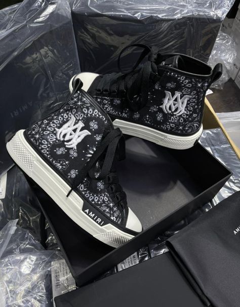 AMIRI draws inspiration from retro basketball silhouettes for these M.A. Court high-top sneakers. Crafted from canvas and leather, this lace-up pair is detailed with an embroidered logo to the side and a double-stacked rubber sole. Highlights black/white canvas leather trim embroidered logo to the side pull-tab at the heel front lace-up fastening round toe stacked sole Amiri Sneakers, Basketball Silhouette, Black White Canvas, Retro Basketball, Smart Tech, Black And White Canvas, White Canvas, Pull Tab, Canvas Leather