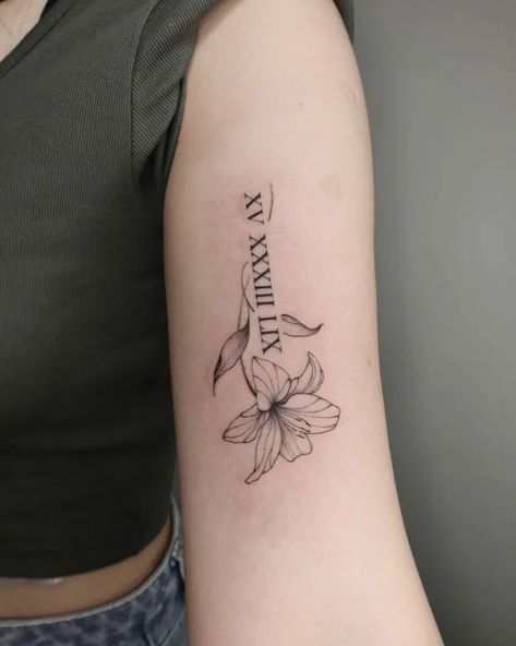 Roman Numeral Tattoo With Lily, Flower With Name Tattoo Ideas, Floral Name Tattoos For Women, Flowers With Roman Numerals Tattoo, Daffodil Tattoo With Roman Numerals, Flower With Roman Numeral Tattoo, Date With Flower Tattoo, Date And Flower Tattoo, Roman Numerals With Flowers Tattoo