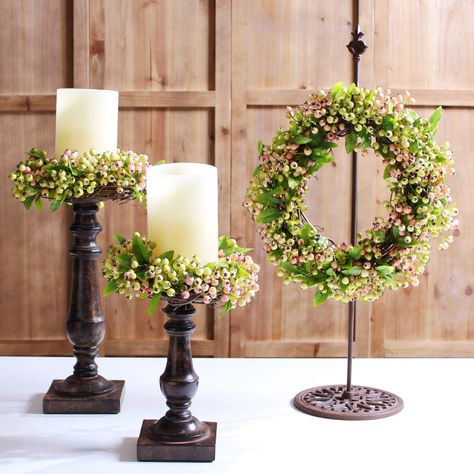 Available in:  Approx 8" diameter x 4" deep (2-3"  hole opening) Approx 12" diameter . x 4" deep (5-6" opening) Candle not included Life-like botanical & floral Designed, Handcrafted in Ohio Darby Creek's Mini & Candle Wreath Collection provides year round beauty for any area in your home. These versatile wreaths can be hung by themselves or in a grouping! They also double as a fabulous centerpiece with a candle placed in the center.  With fresh looking foliage that never fades our Trio Set Pink Candle Wreath Centerpiece, Pepper Berry, Everyday Centerpiece, Stick Wreath, Stick Decor, Wreath Centerpiece, Candle Wreath, Floristry Design, Quinceanera Planning