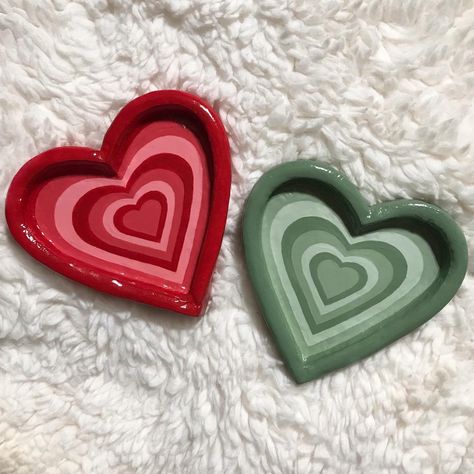 Sage green and red clay tray Clay Art Heart Tray, Small Clay Jewelry Holder, Heart Clay Tray With Eyes, Cute Jewelry Tray, Polymer Clay Tray Jewelry Dish, Aesthetic Clay Tray, Jewelry Clay Tray, Jewelry Tray Ideas, Heart Clay Ideas