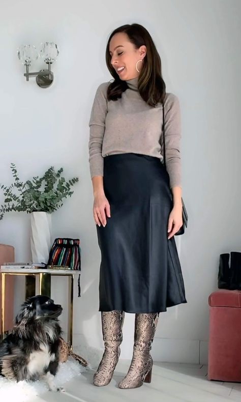 See how to wear a black slip skirt with a turtleneck and boots... 9 more outfit ideas on SydneStyle.com! @sydnesummer #slipskirt #blackskirt #midiskirt #boots #snakeskin #turtleneck Black Satin A Line Skirt Outfit, Slip Skirt Boots, Silk Slip Skirt Outfit Winter, Midi Slip Skirt Outfit Fall, Black Skirt Black Sweater Outfit, Navy Slip Skirt Outfit Winter, Slip Skirt With Boots, How To Style A Black Slip Skirt, Bias Skirt Outfit Winter