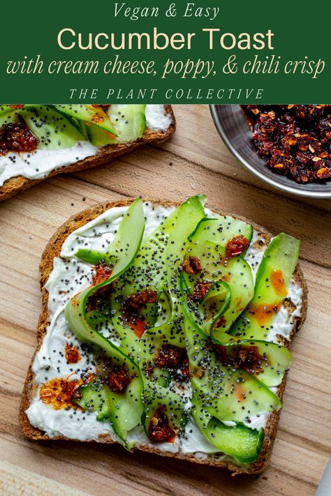 this is a vegan cucumber toast with cream cheese, chili crisp, poppy seeds, and cucumber ribbons. it is a simple 5 minute recipe that only has 5 ingredients.