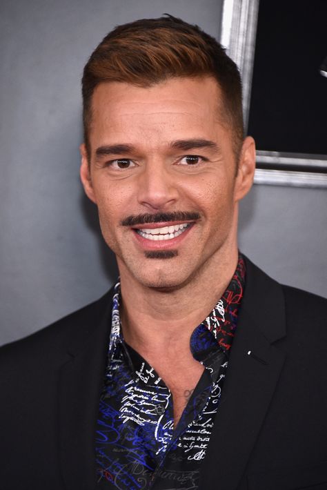 Ricky Martin debuted some interesting facial hair on the 2019 Grammys red carpet: a stick-straight, slender mustache and a matching soul patch. And according to social media, not everyone's on board with the "She Bangs" singer's new look. Soul Patch, Rhett Butler, Grammys Red Carpet, Men's Facial Hair, Mens Facial Hair Styles, John Waters, Tom Selleck, Ricky Martin, Beard No Mustache