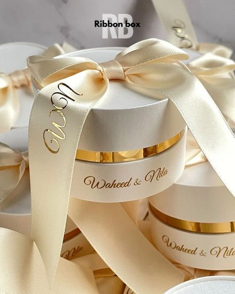 Take your event to the next level with our custom bid boxes, detailed with custom-made ribbons. Elevate your event and create unforgettable memories! ✨🎀 Custom-made bid boxes | Event | Wedding | Shadi Season #wedding #bidboxes #bidbox #custommade #customizedbidboxes #ribbonbox #trendingwedding #shadivibes Affordable Wedding Favours, Handmade Favors, Elegant Wedding Favors, Engagement Favors, Unique Favors, Wedding Gift Boxes, Wedding Favor Boxes, Round Box, Unique Wedding Favors