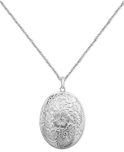 The perfect compartment for four of your favorite photos! This timeless locket features a sterling silver setting and engraved floral surface. Approximate length: 18 inches. Approximate drop: 1 inch. Sterling Silver Locket Necklace, Horizontal Bar Necklace, Silver Locket Necklace, Engraved Locket, Photo Locket Necklace, Sterling Silver Locket, Silver Locket, Jewelry Lockets, Photo Locket