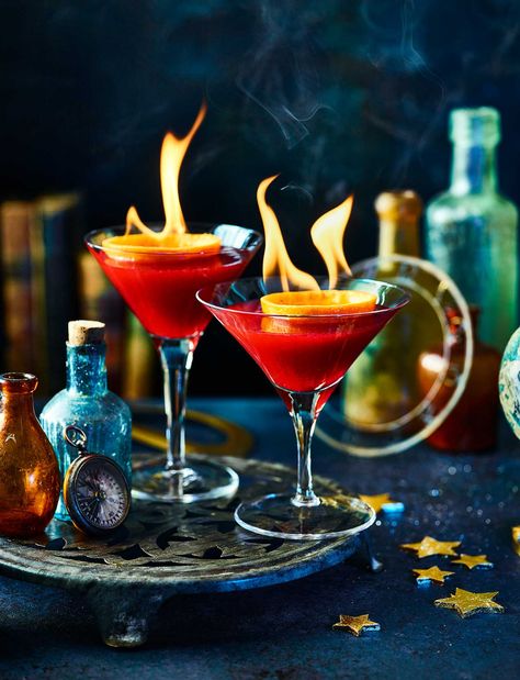 With its vivid red colour and fiery crown, this is the perfect statement drink to enjoy pre or post Christmas dinner Flaming Cocktails, Flaming Drinks, Romantic Cocktails, New Years Cocktails, Red Drinks, Orange Cocktails, Cranberry Cocktail, Cocktail Serving, Fancy Cocktails