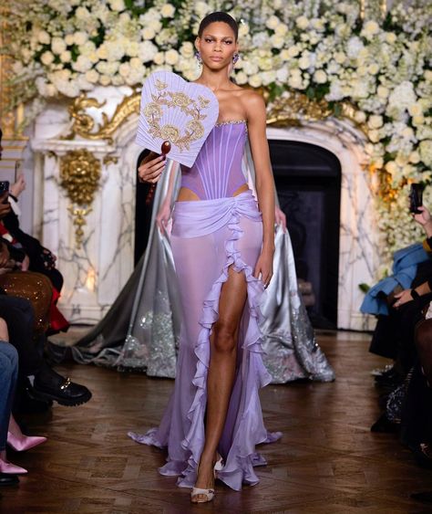 Look 15 Silk chiffon draped skirt and corset look styled with Korean fan handcrafted by a local traditional artisan, made with lavender… | Instagram Miss Sohee, Skirt And Corset, Corset Look, Couture 2024, Corset Looks, High Fashion Runway, Golden Shadow, Princess Core, Peony Flowers