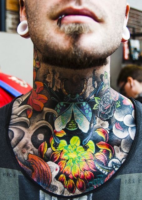 Blue Beetle and Colorful Flowers Neck Tattoo Lots Of Tattoos, Neck Tattoos For Men, Best Neck Tattoos, Tato Dada, Throat Tattoo, Neck Tattoo For Guys, Geniale Tattoos, Neck Tattoos, Chest Tattoo Men