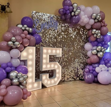 Nicole Creations on Instagram: “Happy 15th birthday Emily! Shimmer wall in silver with lilac tones balloon garland and marquee number 15 #shimmerwall #misquince…” Quinceñera Decoration Ideas Purple, Purple Quinceanera Decor, Lavender Quinceanera Ideas Sweet 15, Led Lights Birthday Decor, Purple Quince Dessert Table, 15 Centerpieces Ideas Butterfly, 15 Birthday Ideas Decorations Purple, Purple Party Ideas Birthday, Lilac And Gold Quinceanera Decorations