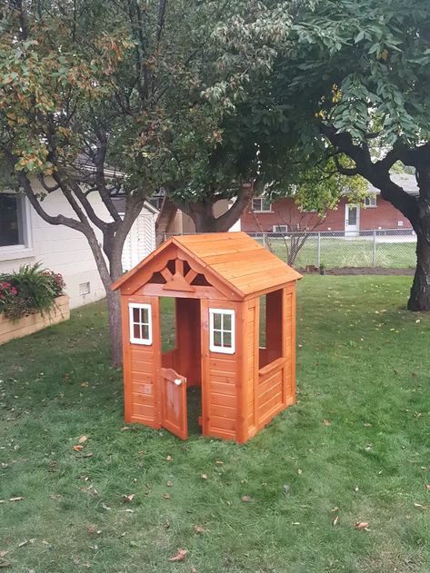 Prefab to Fabulous Upcycled Playhouse | Hometalk Wood Playhouse Makeover, Huge Wine Glass, Diy Backyard Movie, Cedar Playhouse, Boxwood Bush, Making A Compost Bin, Wood Playhouse, Faux Fireplace Mantels, Door Lights