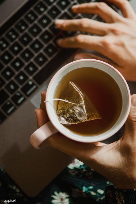 Woman holding a cup of tea while using a laptop | premium image by rawpixel.com / McKinsey Drinking Tea Photography, Holding A Cup Of Tea, Mate Tee, Creative Backyard, Photography Ideas At Home, Herbal Teas Recipes, Iced Tea Recipes, Tea And Books, Coffee Photography