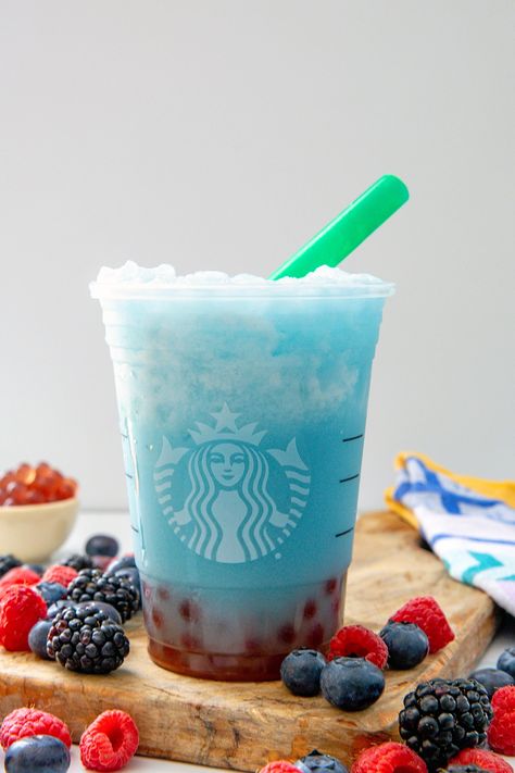 This easy-to-make Starbucks Summer Skies Drink copycat takes the Summer-Berry Refresher base and mixes it with coconut milk and raspberry pearls. Starbucks Summer Skies Drink Copycat, Summer Skies Drink, Summer Skies Starbucks Recipe, Starbucks Drink To Make At Home, Summer Skies Drink Starbucks, Starbucks Summer Skies Drink, Summer Skies Starbucks, Drinks You Can Make At Home, Starbucks Boba Drinks