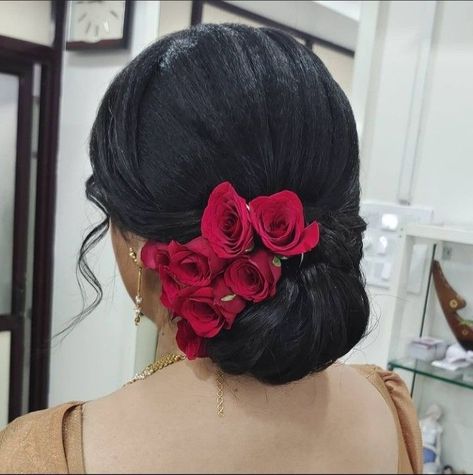 Adorable Artificial Flower Buns for Any Occasion Traditional Low Bun Hairstyles, Hair Bun With Red Roses, Side Rose Hairstyle Indian, Mexican Bun Hairstyles, Hairstyle For Mother Of The Bride Indian, Shadi Preparation, Flower Bun Hairstyle, Indian Bun Hairstyles, Trendy Bun