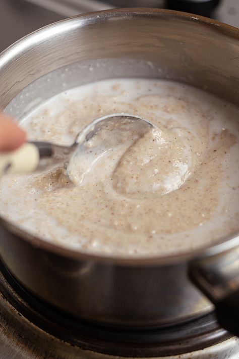 jamaican peanut porridge with coconut milk in a bowl Porridge Jamaican, Peanut Porridge, Peanut Punch, Jamaican Recipe, Jamaican Breakfast, Creamy Oats, Popular Breakfast Recipes, Oatmeal Porridge, Recipe Web