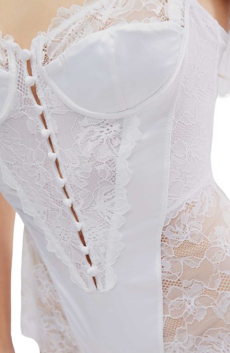 Sheer lace and solid panels create an elegant and sultry vibe atop this corset-inspired bodysuit. Front button-and-loop closure Sweetheart neck Adjustable straps 95% polyester, 5% spandex Hand wash, dry flat Imported Bridal Bodysuit, Elegant Bodysuit, Bridal Lingerie Set, Outfit Creator, White Lace Bodysuit, Wedding Corset, White Lace Lingerie, White Bustier, Bustier Bodysuit