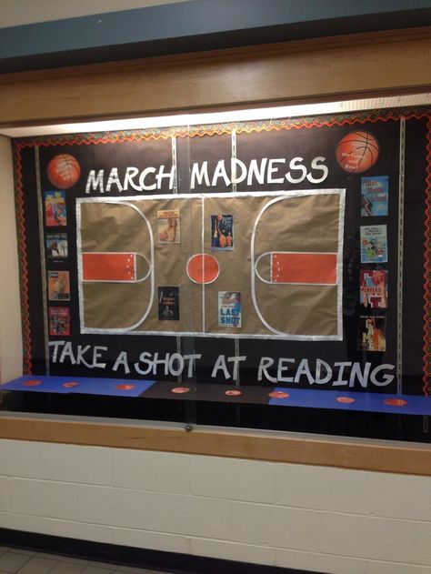 Middle school library bulletin board for March - March Madness, take a shot at reading! March Madness Bulletin Board, Middle School Library Bulletin Boards, Book Bulletin Board, School Library Bulletin Boards, March Bulletin Board, School Library Decor, March Reading, Reading Display, School Library Displays