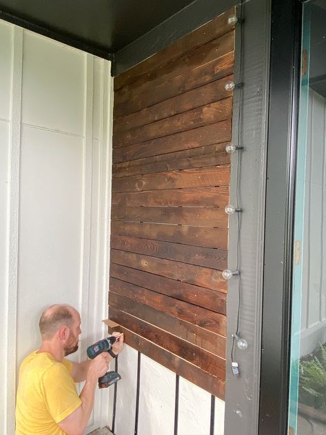 Outdoor Wood Slat Accent Wall, Front Porch Accent Wall, Wood Siding Stain Colors, Exterior Wood Slat Accent, Wood Accent Around Front Door, Outdoor Cedar Wall, Diy Wood Slat Wall Exterior, Outdoor Wood Slat Wall, Stained Slat Wall