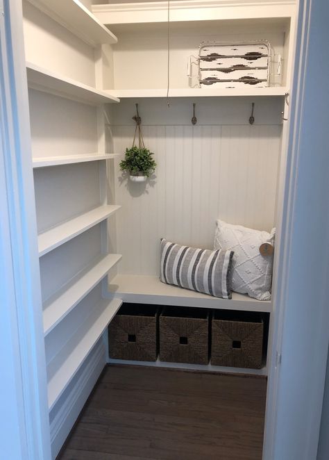 Large closet turned into Mudroom/pantry combination.  Baskets for shoes, cozy seat, hooks and shelves. Pantry And Closet Combination, Pantry Mudroom Combo, Mud Room And Pantry Combo, Closet Turned Into Mudroom, Mudroom Pantry, Shoes Cozy, Laundry Room/mudroom, Mudroom Closet, Cozy Seats