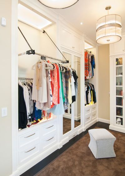 This pull down shelf makes its easy for people who are shorter to get clothes on upper clothing rods. #Closet #ClosetDesign #CustomCloset #ColumbusCloset Upper Closet Storage, Pull Down Storage, Closet With Tall Ceilings, Smart Closet Design, Pull Down Shelves, Tall Closet, Short Closet Ideas, Pull Down Shelf Closet, Pull Down Closet