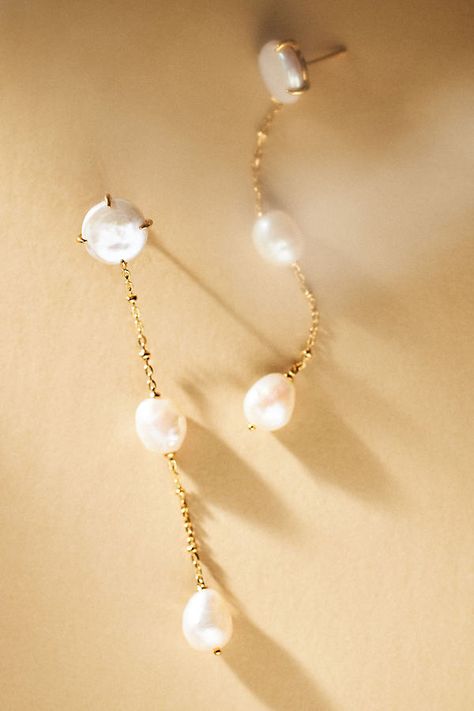 These elegant earrings by NADRI showcase three delicate pearls suspended along a dainty drop chain, effortlessly adding timeless sophistication to classic and contemporary bridal looks. | Dot Linear Pearl Drop Earrings by NADRI in Gold, Women's, Gold/Cubic Zirconia/Sterling Silver at Anthropologie Elegant Wedding Jewelry Brides, Pearl Drop Earring, Wedding Jewelry Pearls, Pearl Dangle Earrings Wedding, Wedding Earrings Bride, Elegant Bridal Jewelry, Pearl Jewlery, Pearl Wedding Accessories, Bridal Earrings Gold