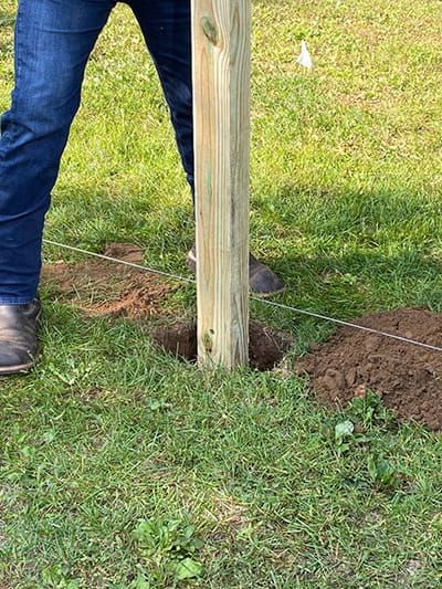 Setting Fence Posts In Concrete, How To Install Fence Posts, How To Install A Wood Fence, Fence Posts Installation, How To Install Wood Fence Panels, Fence Installation Diy, Wood Post Fence, Diy Fence Post, Setting Fence Posts